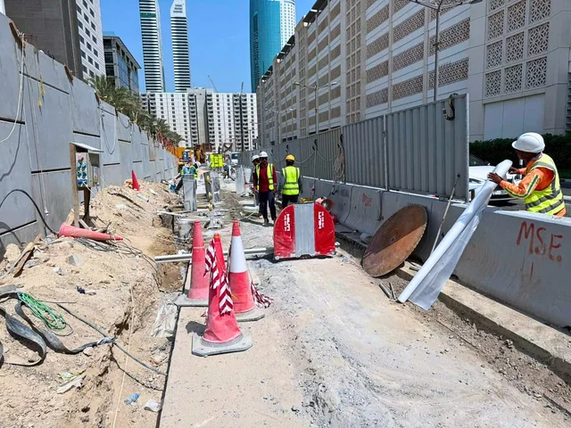 Arasar equipment and concrete foundation work zone beside Al Mustaqbal Road